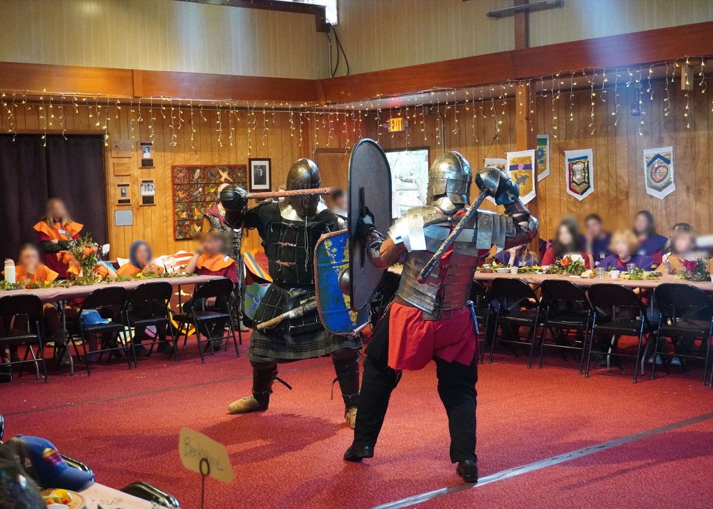Heavy fighters John Latson and Ben Ward demonstrate perfect form at Siskiyou School in Ashland, Oregon. April 16, 2026. Kids' faces are blurred for identity protection.