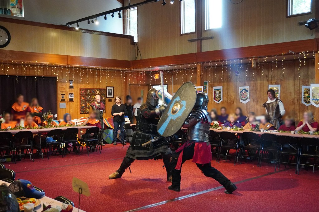 Heavy fighters John Latson and Ben Ward demonstrate perfect form at Siskiyou School in Ashland, Oregon. April 16, 2026. Kids' faces are blurred for identity protection.