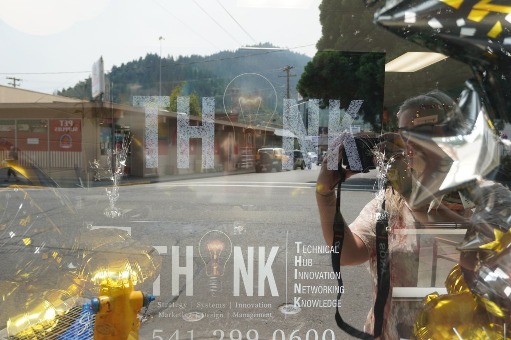a picture Looking into street window at THINK